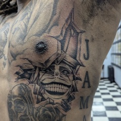 black-and-grey-anime-ultimate-being-tattoo