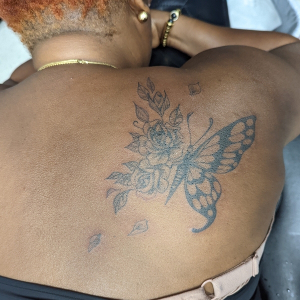 Blackwork Butterfly Tattoo with Roses
