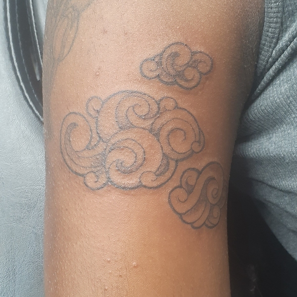 fineline-clouds-tattoo-sm