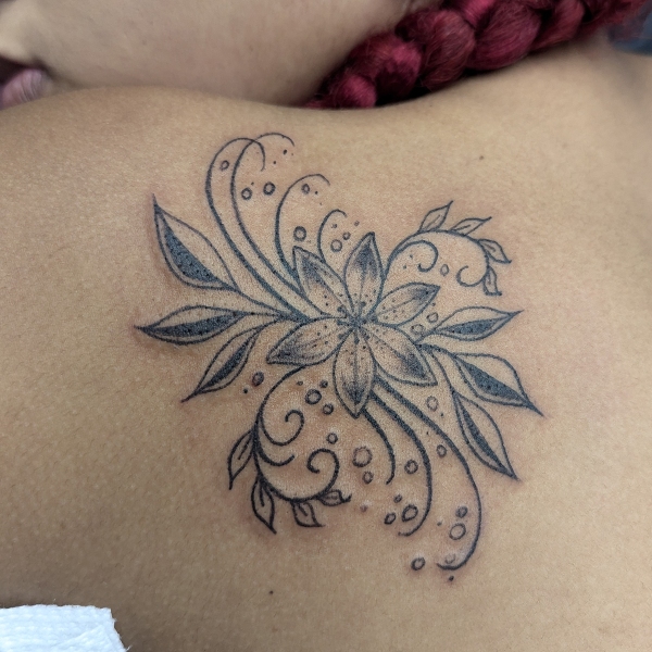 traditional-blackwork-lillies-tattoo