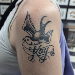 healed-kay-tradtional-swallow-tattoo