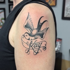 kay-traditional-swallow-tattoo