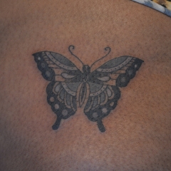 Opaque Black and Grey Butterfly tattoo