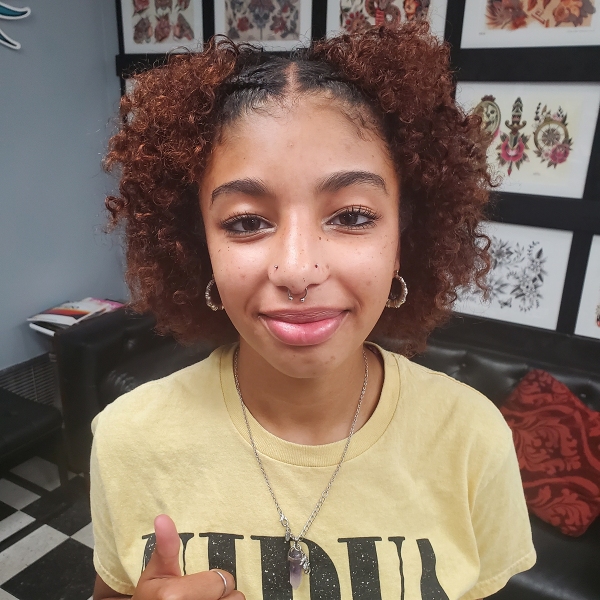 Septum Piercing with Double Nose Piercings