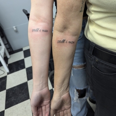 still-i-rise-small-lettering-tattoo