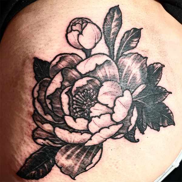 Flower bouquet with heavy black peony tattoo