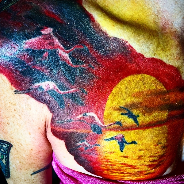realistic-japanese-cranes-and-sun-tattoo