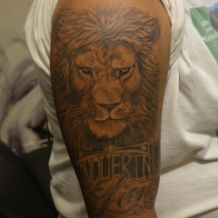 Conquering Lion Tattoo