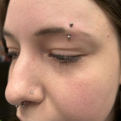 Eyebrow, nose and Septum Piercings