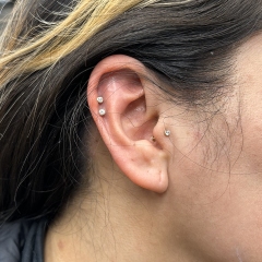 Double Helix and Tragus Piercings