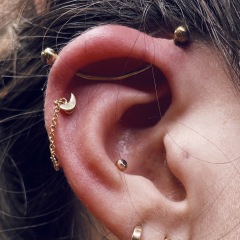 Curved Industrial piercing with helix