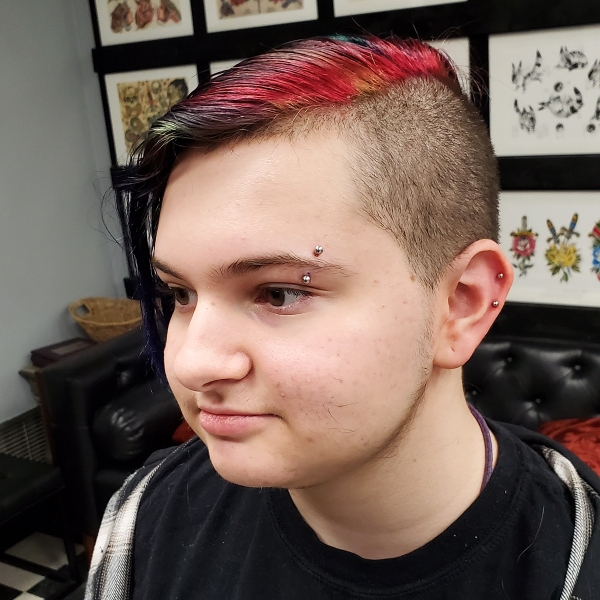 eyebrow-and-double-helix-piercing