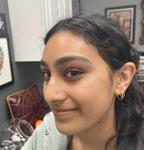 gold-nose-and-lobe-piercings