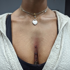 double-dermal-chest-peircing