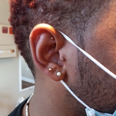 Rook, tragus, and seconds piercing