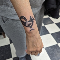 ethnic-tribal-chicken-tattoo