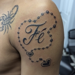 fe-faith-traditional-blackwork-rosary-tattoo