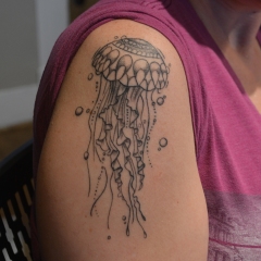 Healed jellyfish tattoo,