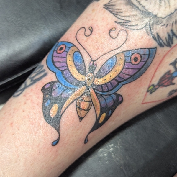blue-purple-traditional-butterfly-tattoo