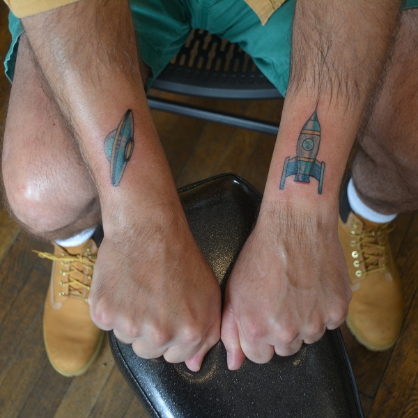 Matching Spaceship Tattoos