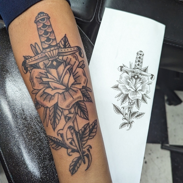 Traditional Black and Grey Rose Dagger Tattoo