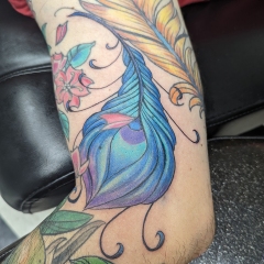 Blue Ice Pheonix Feather Tattoo