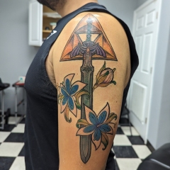 Legend of Zelda Sword Tattoo with flowers