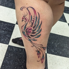 Magenta and Teal Traditional Pheonix Tattoo