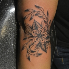 Black Traditional Flower Tattoo